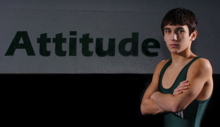 Mild-mannered Carton is all business on the mat